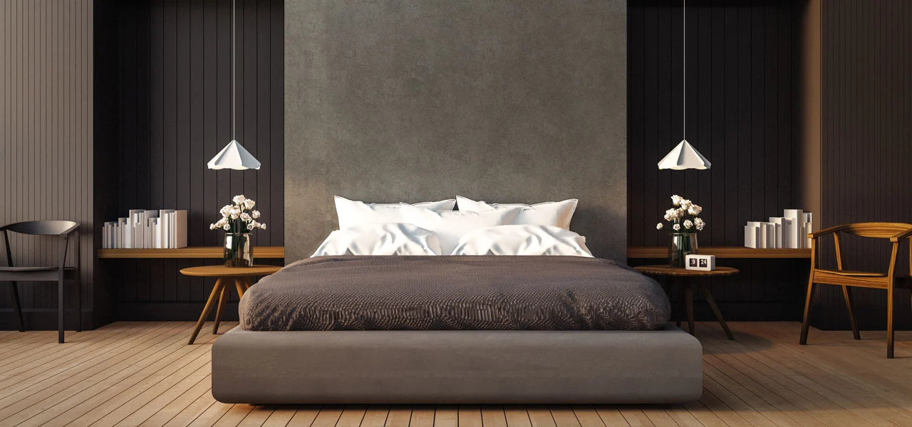 Schlafzimmer mit einer metallischen Wandgestaltung im Hintergrund